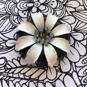 Stunning black White 1960’s enamel flower brooch